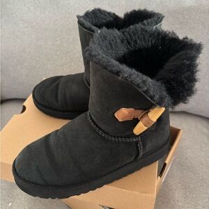 UGG Black fur Winter Boots with tan button clasp